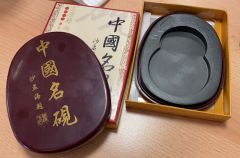 Ink Stone oval shaped with dragon head gently engraved on the edge of the stone